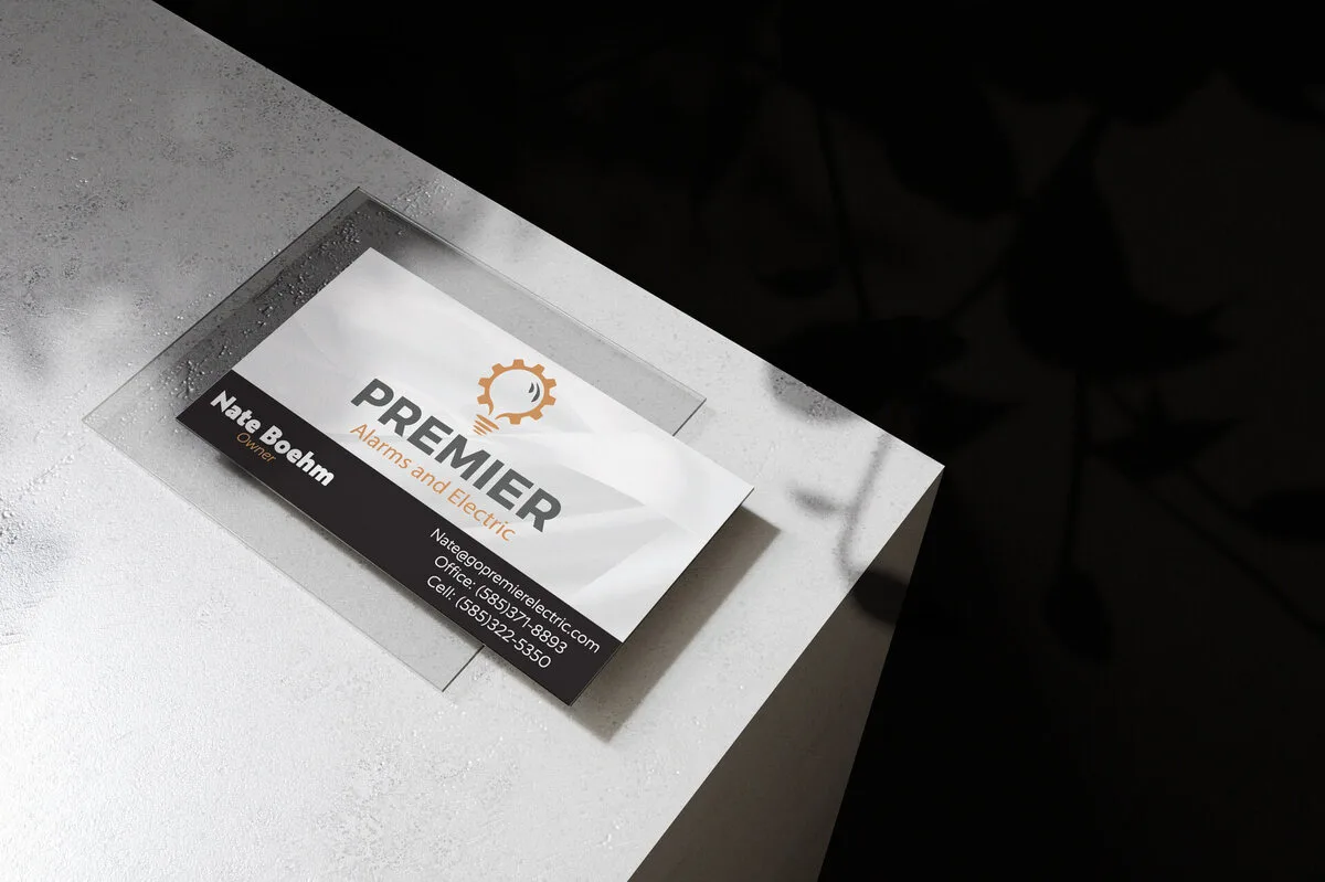 Premier Alarms and Electric business card designed by Zandyr Meakin
